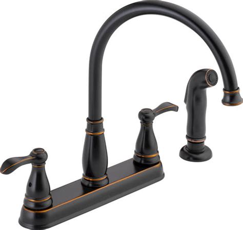 Reviewers say this faucet adds immediate interest to your kitchen, all while performing flawlessly. Delta® Porter® 2-Handle Side Sprayer Kitchen Faucet at ...
