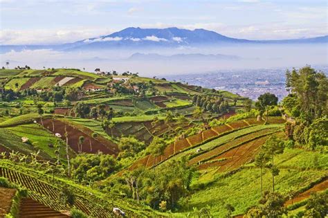 west java between a megalopolis and steaming acid lakes travel magazine for a curious