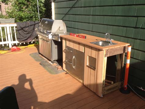 Outdoor Kitchen Using Stainless Steel Base Of An Old Grill Outdoor