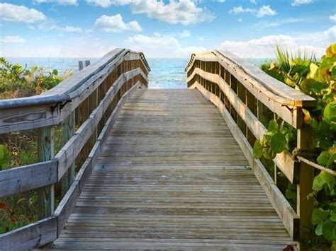 Where nature meets the sea. Sanibel Inn boardwalk | Sanibel inn, Beachside resort ...