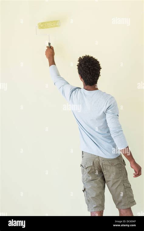 Man Painting Wall Stock Photo Alamy