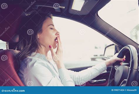 Sleepy Woman Driving Her Car After Long Hour Trip Isolated Street