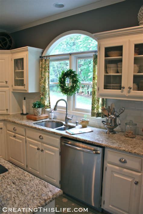 Open cabinets are more of open shelving that allow you to display your kitchen equipments and ceramics in style. Our House Story - Creating This Life