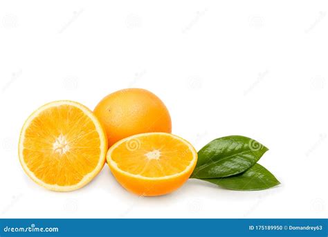 Orange Whole And Cut Into Halves With Leaves Isolated On A White