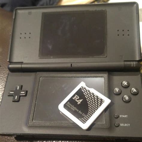 Nintendo dsi lite con memoria 32gb con 320 juegos. Nintendo DS Lite With R4 Card, Video Gaming, Gaming ...