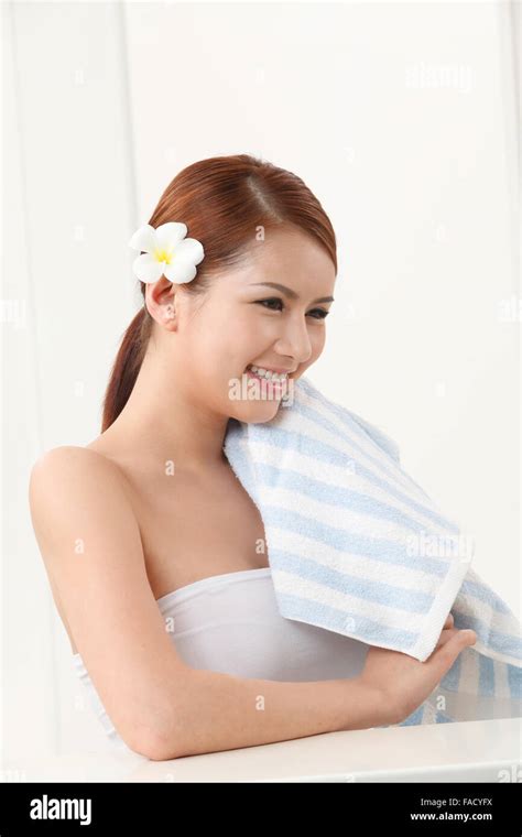 Woman Drying Off With Towel Stock Photo Alamy