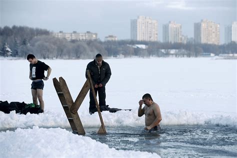 Epiphany Russian Orthodox Christians Plunge Into Frozen
