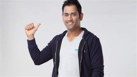 Ms Dhoni Is Standing In White Background Wearing White Blue Overcoat Hd