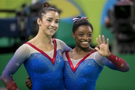 Olympic Champs Simone Biles And Aly Raisman Posing In Si Swimsuit Issue Baltimore Sun