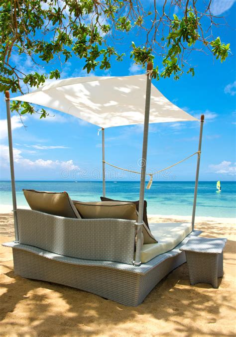 Luxury Relax Chair on a Beautiful Tropical Beach Stock Photo - Image of