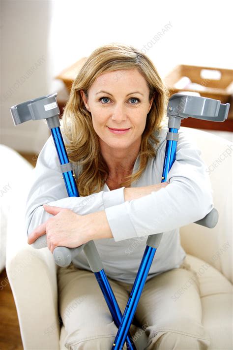 Woman With Crutches Stock Image C0316157 Science Photo Library