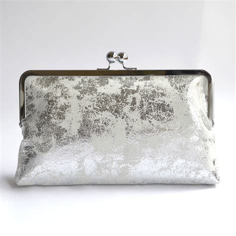 Metallic Silver Clutch Bag With Kiss Lock Closure And Vintage Kimono Lining