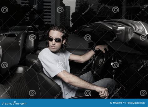 Man In A Car Backing Up Stock Image Image Of Convertible 10582757