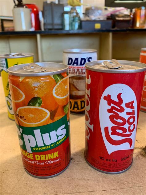 9 Assorted Vintage Soda Cans