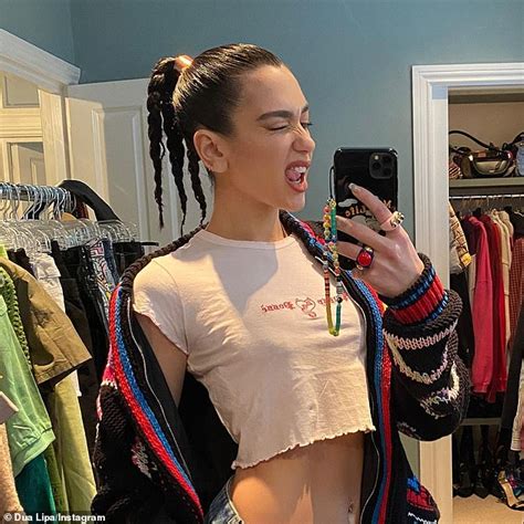 Dua Lipa Shows Off Her Toned Abs As She Poses In A Crop Top While