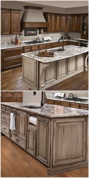 Starmark cabinetry has a variety of kitchen cabinets and bath vanities to fit all needs and styles. Notice the coordinating corbels on the hood and island in this dual-colored kitchen. | Kitchen ...