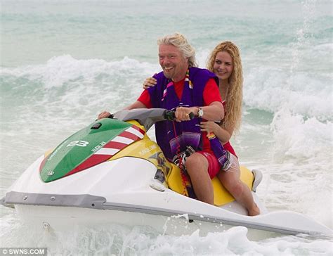 Richard Branson Gets Into The Cancun Spirit As He Frolics On The Beach