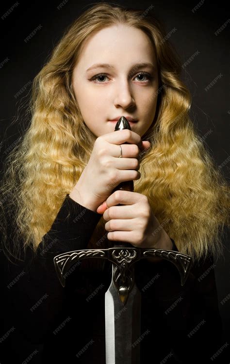 Premium Photo Fine Art Portrait Of Girl With Sword