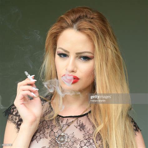 Check spelling or type a new query. Glamorous Young Beautiful Latin Woman Smoking Cigarette ...