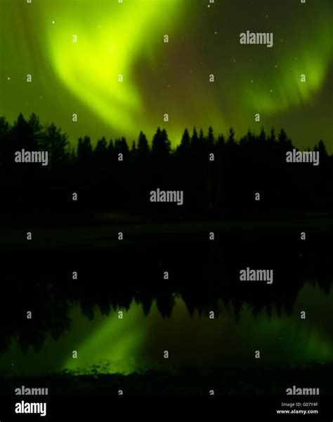 The Northern Lights Aurora Borealis Above Lapland Sweden Stock Photo