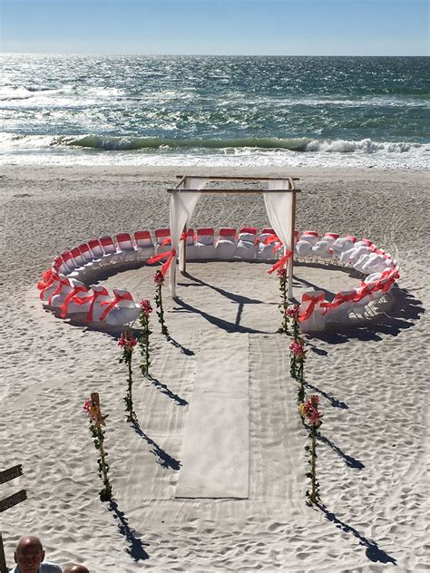 White carpet for wedding ceremony. Sea of Love, beach wedding decor, bamboo trellis, chairs ...