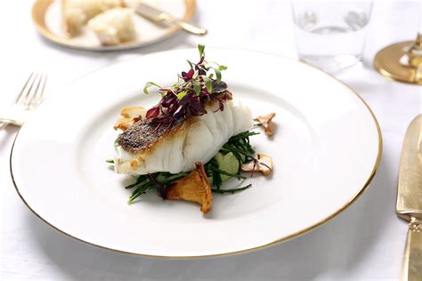 Locked away in the kitchen, chained to the stove, then before you know it, your guests have left and you've barely said two words to them. Plated dinner party main course (roast fillet of cod with ...