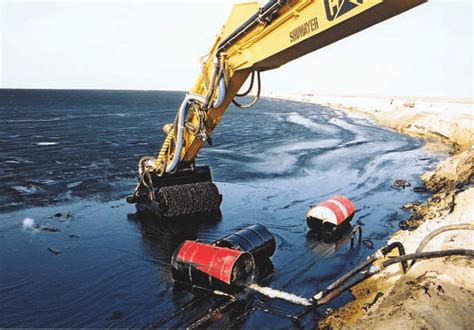 Photograph Of An Oleophilic Brush Skimmer Operating In A Nearshore Area