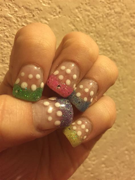 Yellow nails have been all the craze lately and this set grey nail art yellow nail art gray nails purple nails casual nails trendy nails blue sparkles pink. Green pink yellow blue Easter egg sparkly nails | Sparkly ...