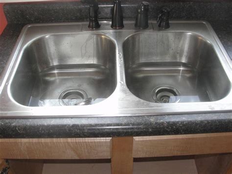 A clogged kitchen sink can be a nightmare in the kitchen. Common Problems With Flipped Houses | CPT