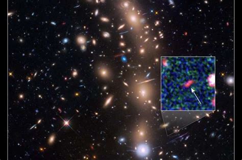 Hubble And Spitzer Telescopes See Magnified Image Of The Faintest Galaxy From The Early Universe