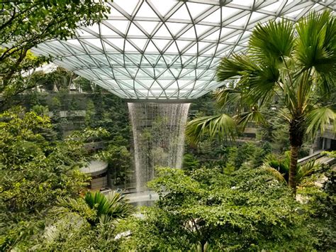 At night, the waterfall becomes. moshe safdie's jewel changi airport nears completion in ...