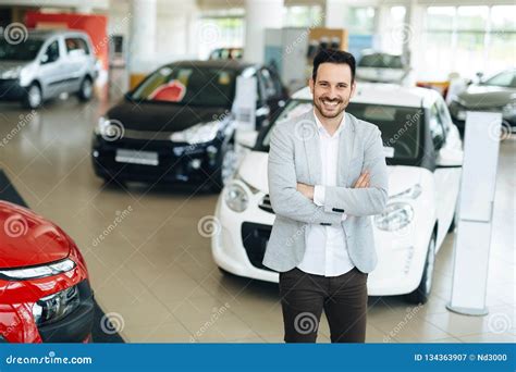 Salesperson At Car Dealership Stock Image Image Of Handsome Salesman