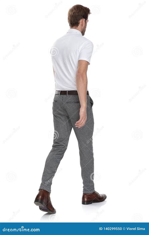 Side Rear View Of A Smart Casual Man Walking Away Stock Photo Image