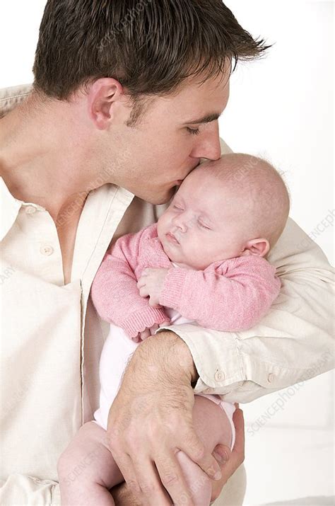 Father Kissing His Baby Stock Image C0018886 Science Photo Library
