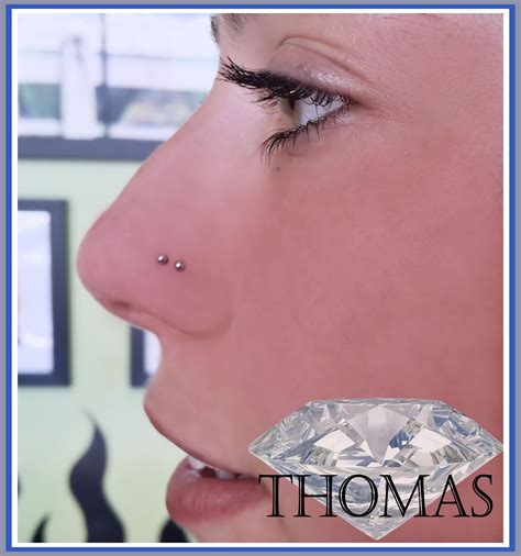 Double Nose Piercing With Steel Studs Nose Piercing Placement Nose