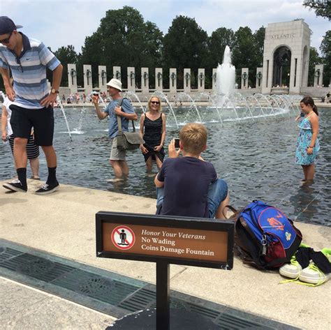 Outrageous Disrespect Pictures 100 People Wade Into Ww2 Memorial