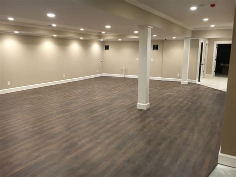 Will this be a playroom for young kids? New Floating Vinyl Floor in Basement - Bukovac Remodel