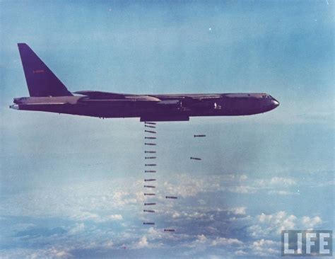 American B 52 Dropping Payload Of Bombs Onto Viet Cong Positions During