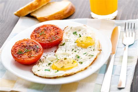 Breakfast With Fried Eggs And Tomato Stock Image Image Of Food
