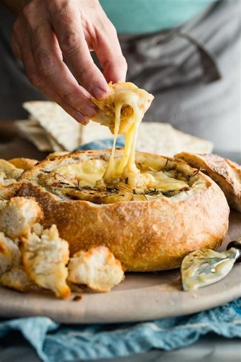 The Ultimate Holiday Party Appetizer Baked Brie In A Sourdough Bread