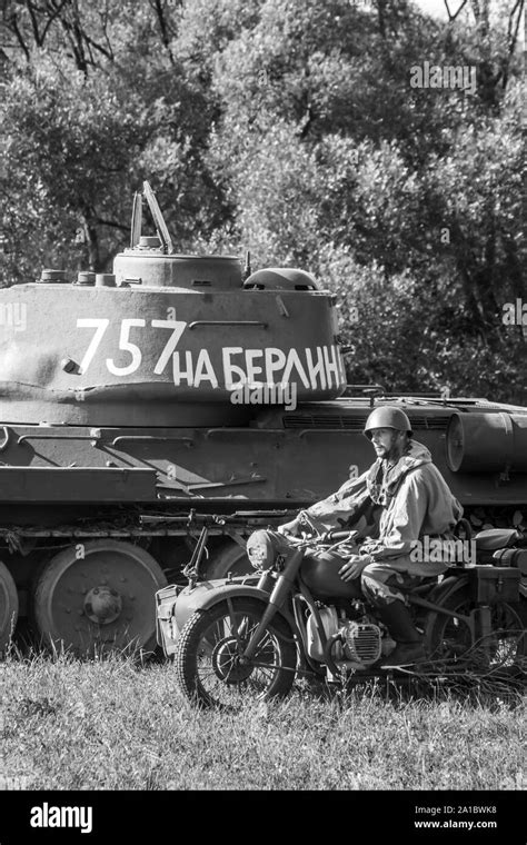 Soviet Tank T 34 Military Motorcycle And Soviet Soldier During The
