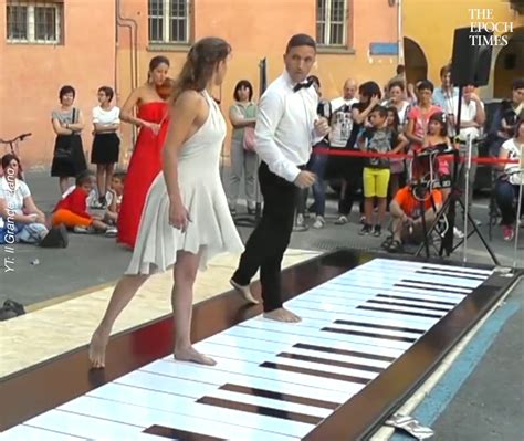 Couple Plays Music On Giant Piano With Their Feet Foot Intimate