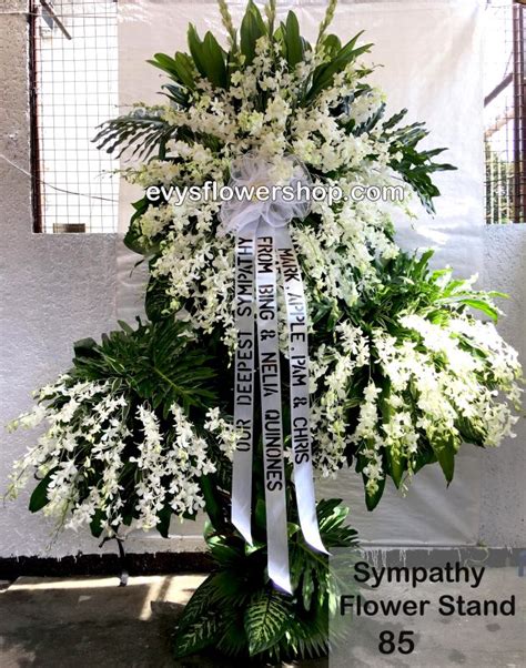 Check spelling or type a new query. sympathy flower stand 85- Evys Flowershop I Call 3305174 ...