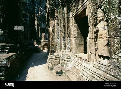 Stone Statue Carved Into A Wall Of The Bayon Temple Angkor Thom