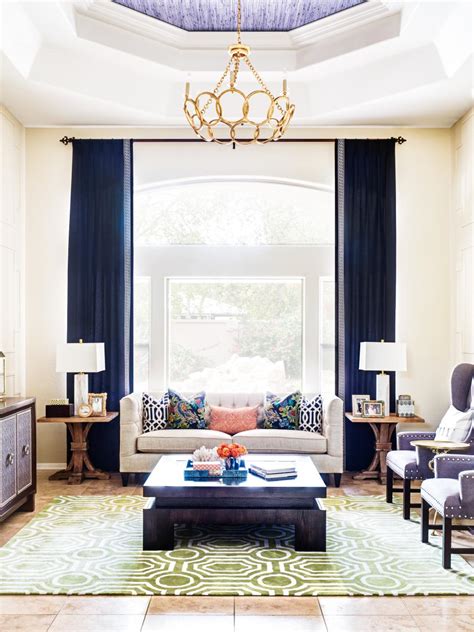 Neutral Transitional Living Room With Blue Curtains Hgtv
