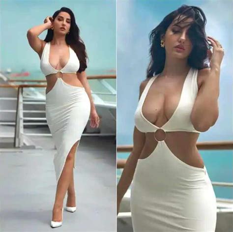 nora fatehi sexy video photo nora fatehi made a sexy pose with a make up artist out for a sea