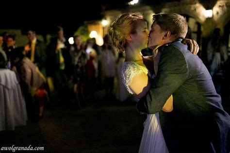 The Couple Kissing At The First Dance