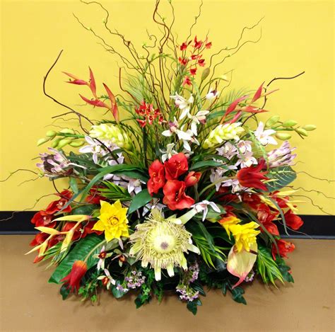 Designed By Arcadia Floral And Home Decor Tropical Flower Arrangements Flower Arrangements