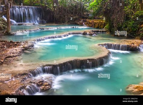Scenic Kuang Si Falls Landscape A Beautiful Cascading Waterfall In A