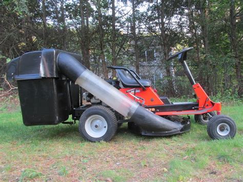 Ariens Rm1028 Rear Engine Rider With Twin Bin Bagger Ronmowers